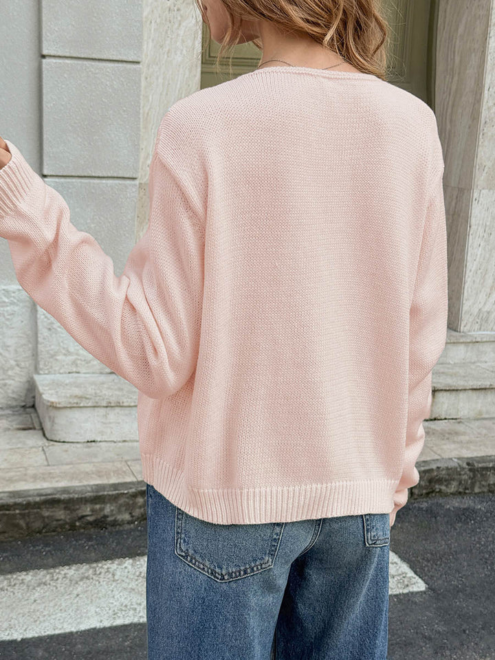 Cardigan ample boutonné à manches longues, à poches, à empiècements, à col rond, couleur unie