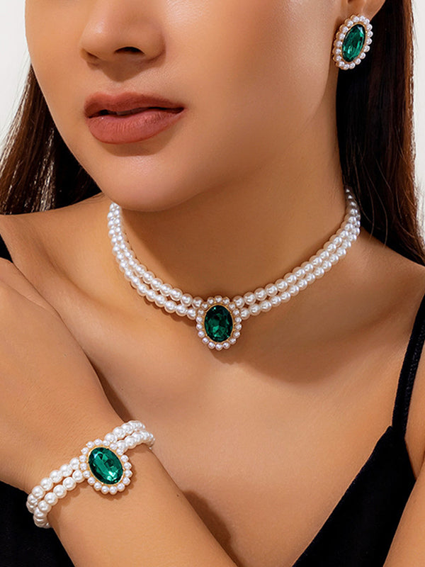 Parure collier et boucles d'oreilles géométrique superposée à strass