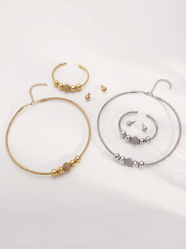 Ensemble trois pièces géométrique – collier + bracelet + boucles d'oreilles