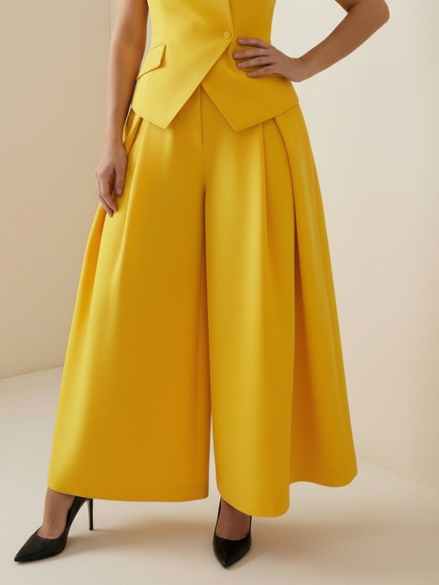 Pantalon ample plissé taille haute, à empiècements, couleur unie