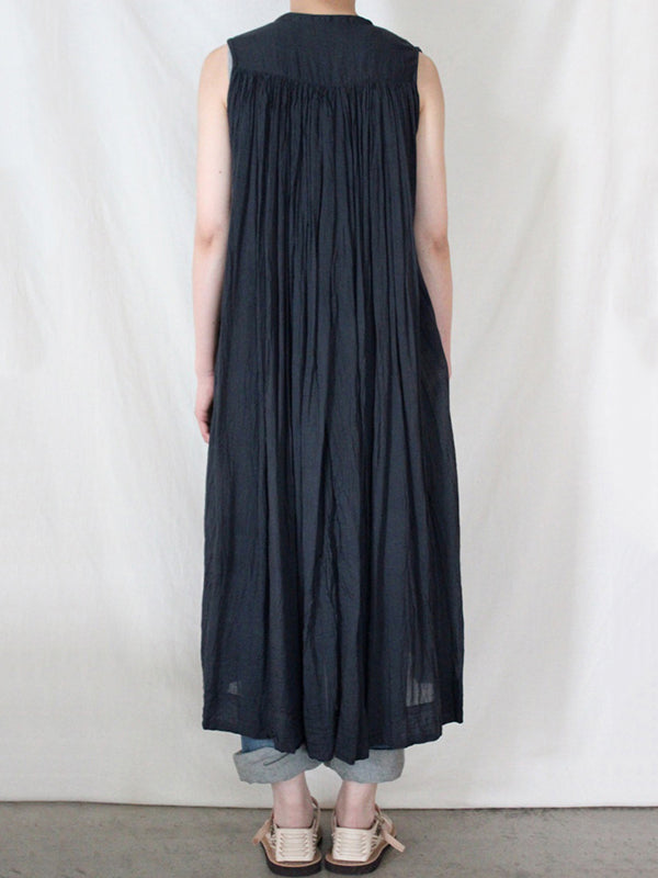 Robe mi-longue ample plissée transparente sans manches, à col rond