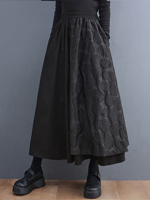 Jupe ample asymétrique coupe trapèze, à taille élastique, en jacquard, couleur unie