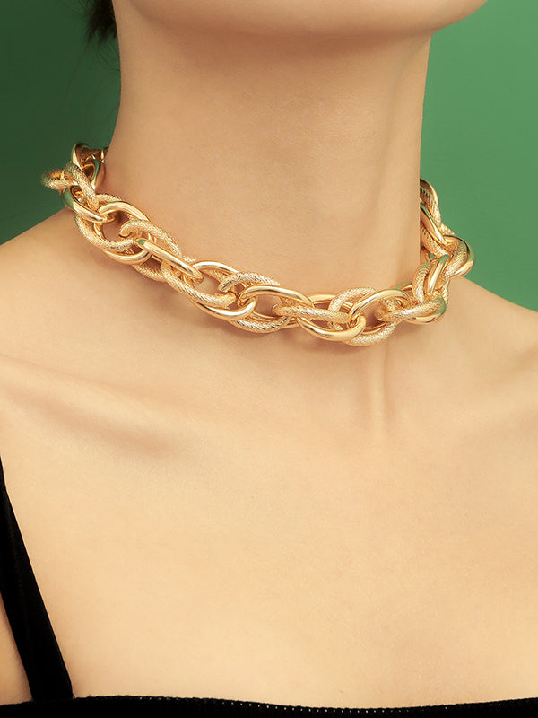 Parure collier et bracelet ajourée couleur unie