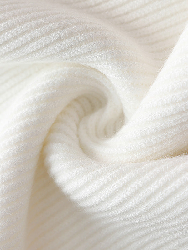 Tricot décontracté ample de couleur unie à col haut et manches longues