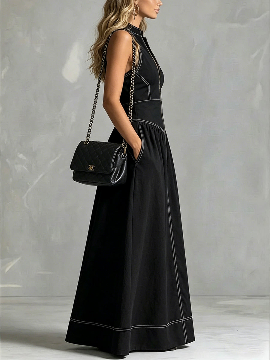 Robe longue plissée coupe trapèze, taille haute, à poches, à fermeture éclair, à col montant, couleur unie