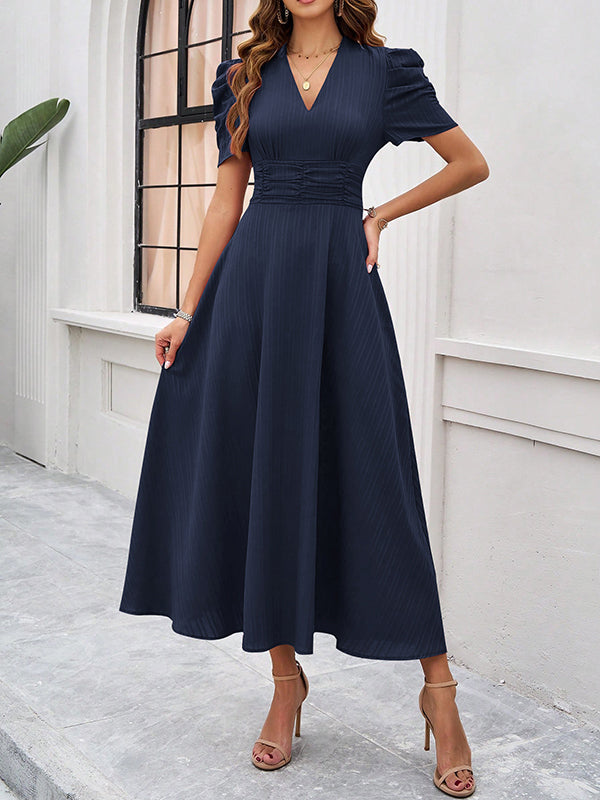 Robe longue plissée coupe trapèze, taille haute, à fermeture éclair, à col en V, couleur unie