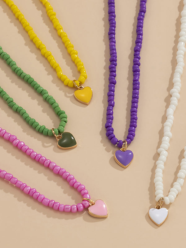 Collier à perles, couleur unie