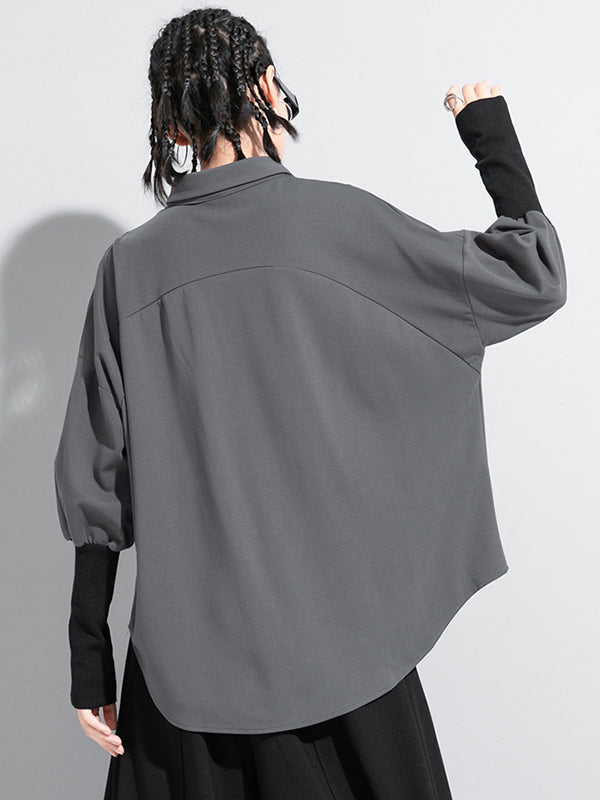 Chemise grise noire à empiècements, col polo