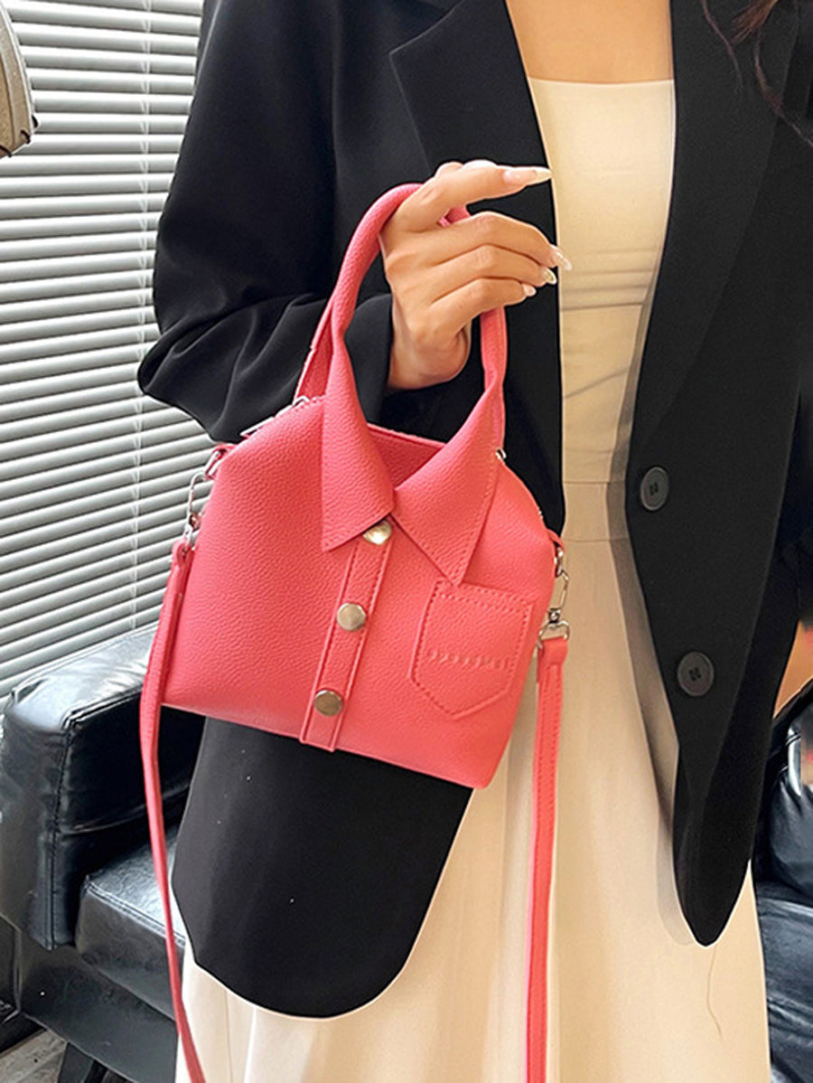 Sac à main bandoulière géométrique boutonné couleur unie