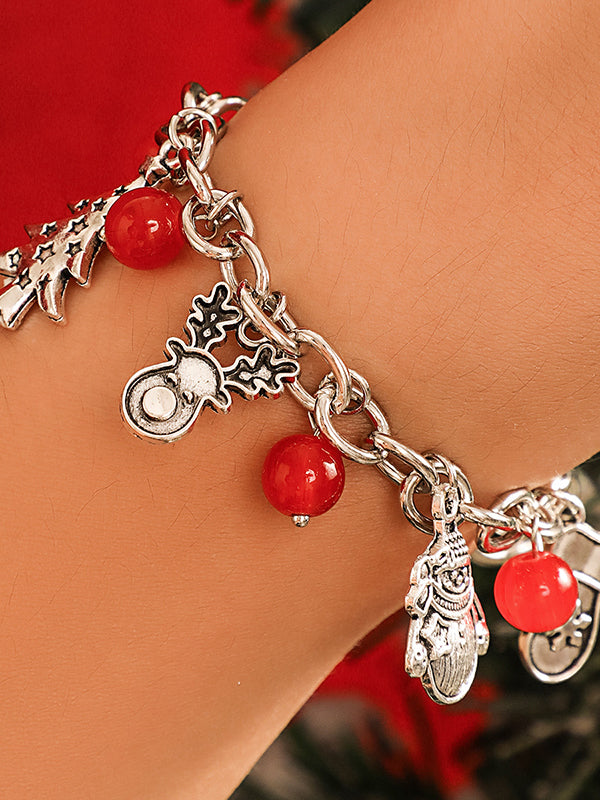 Bracelet géométrique à pompons