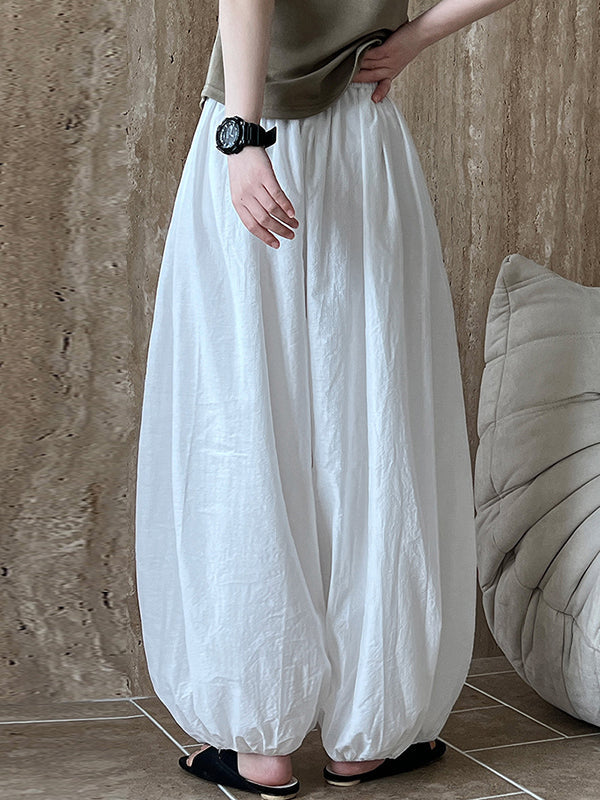 Pantalon taille haute, à taille élastique, à empiècements, couleur unie