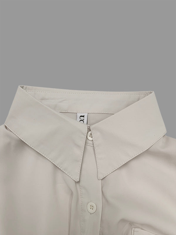 Robe mi-longue boutonnée plissée à ourlet plongeant, à manches longues, à cordon de serrage, à poches, à col revers, couleur unie
