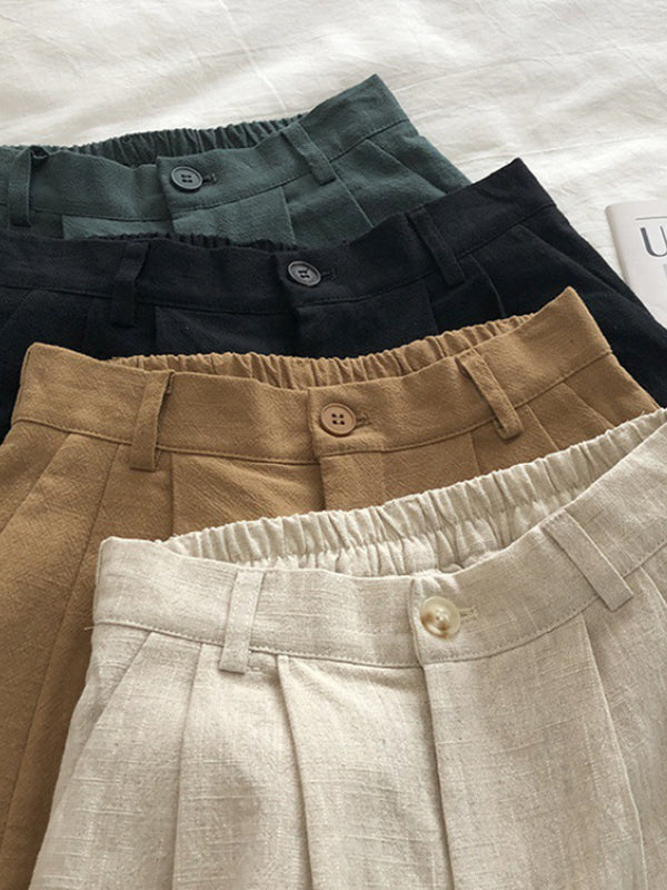 Short ample plissé à jambes larges, à taille élastique, couleur unie