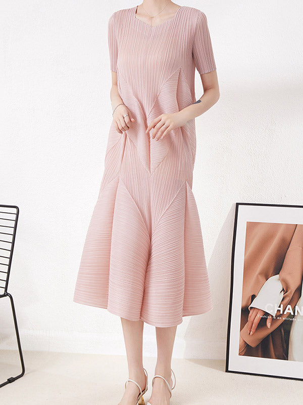 Robe mi-longue ample plissée taille haute, à col rond, couleur unie