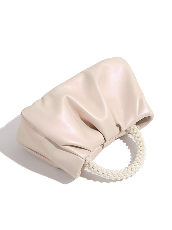Sac à main perlé à empiècements
