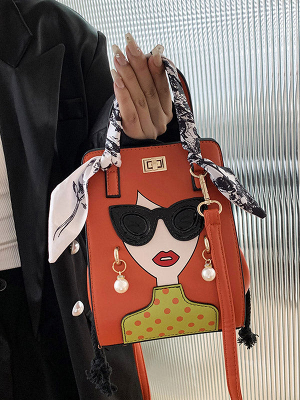 Sac à main imprimé à motifs figuratifs, à empiècements