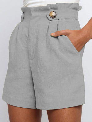 Short ample plissé taille haute, à empiècements
