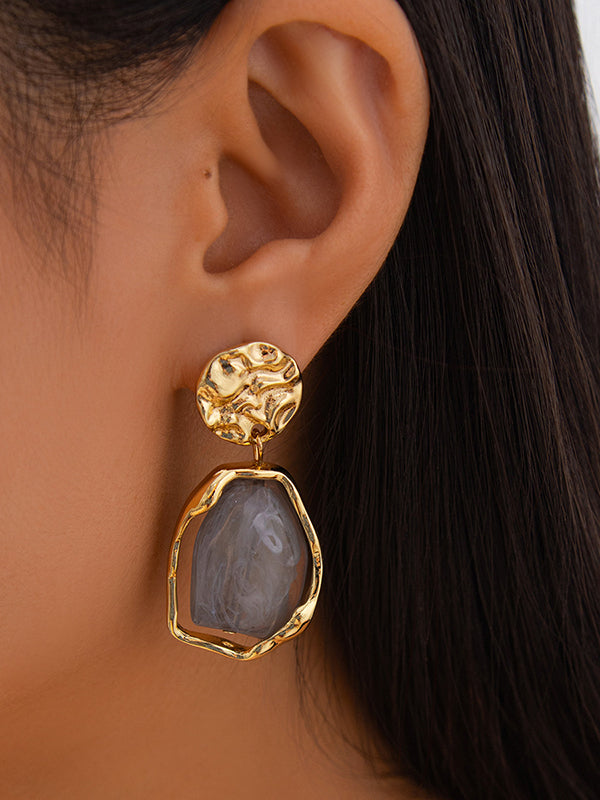 Boucles d'oreilles géométriques brillantes à coupe irrégulière