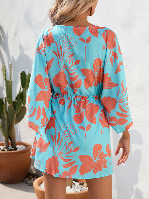 Robe courte boutonnée coupe trapèze, à manches mi-longues, à cordon de serrage, à imprimé floral, à col en V