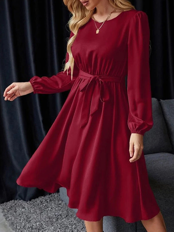 Robe mi-longue ample plissée à manches bouffantes, à taille élastique, à empiècements, à taille nouée, à col rond, couleur unie