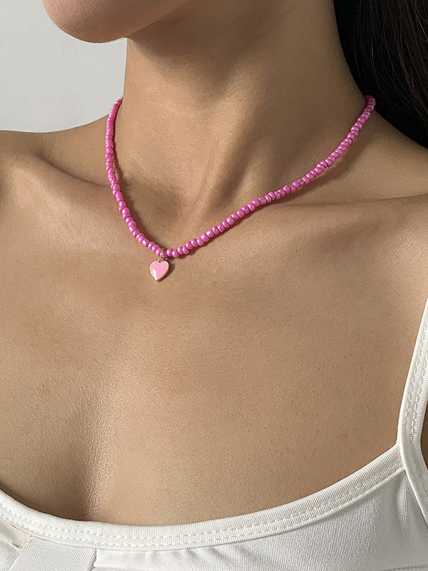 Collier à perles, couleur unie