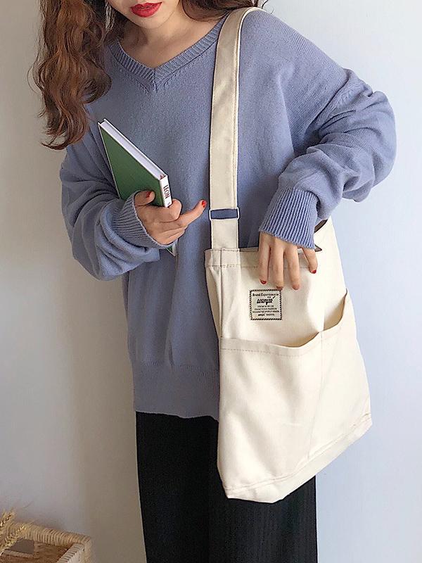 Sac à main simple en toile de couleur unie avec poches