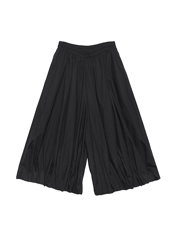 Pantalon élégant noir taille haute, à jambes larges, couleur unie