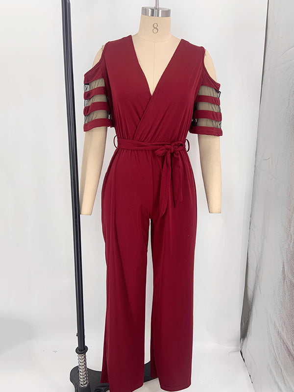 Combinaison ample ajourée taille haute, en résille, à taille nouée, à col en V, couleur unie