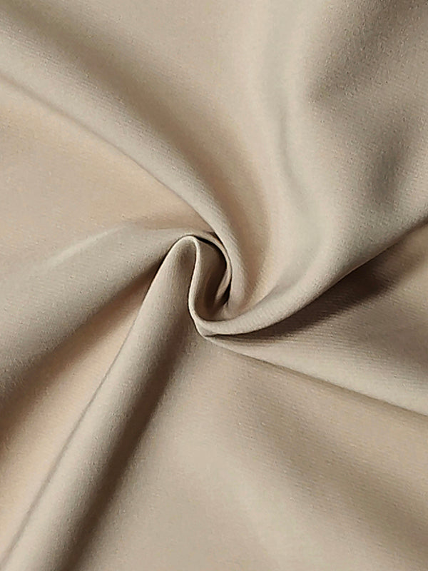 Robe mi-longue ample plissée taille haute, à col rond, couleur unie