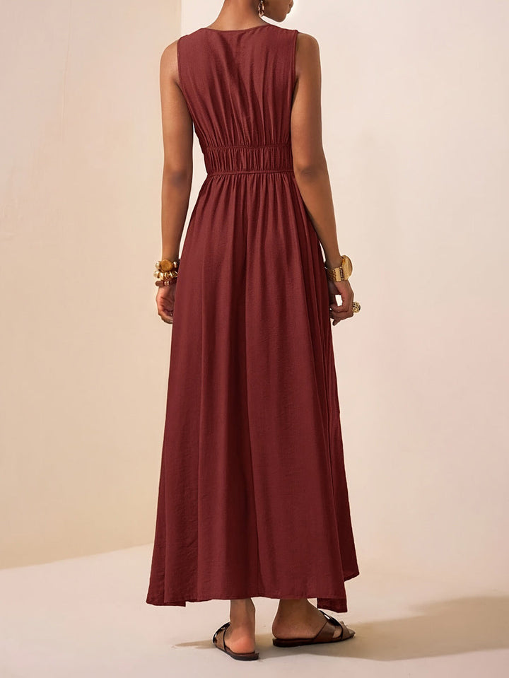 Robe longue ample plissée coupe trapèze, à fines bretelles, couleur unie