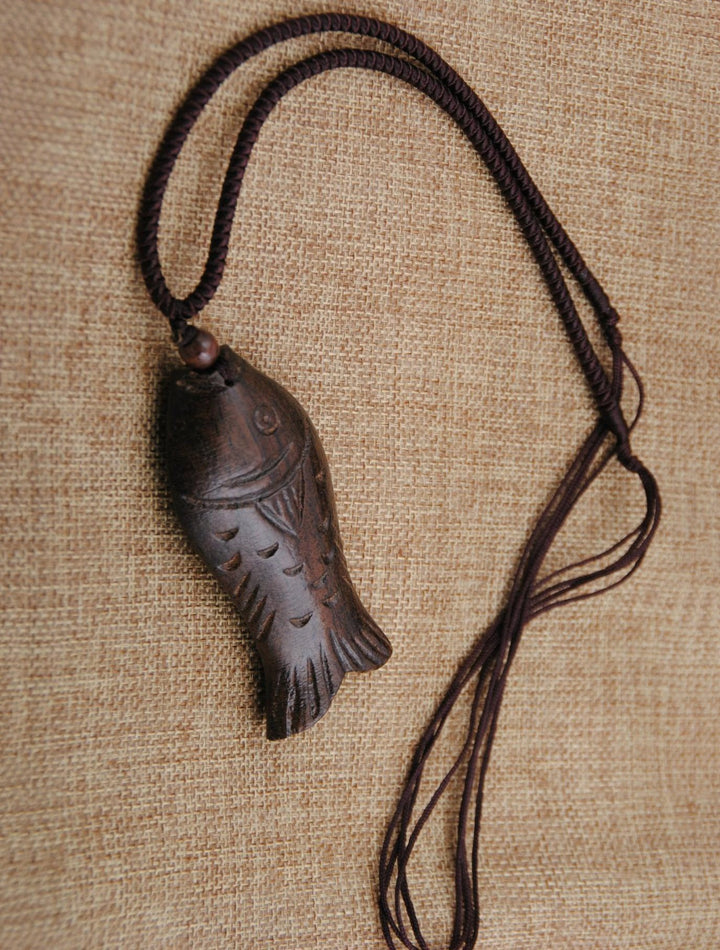 Collier de poisson en bois national naturel