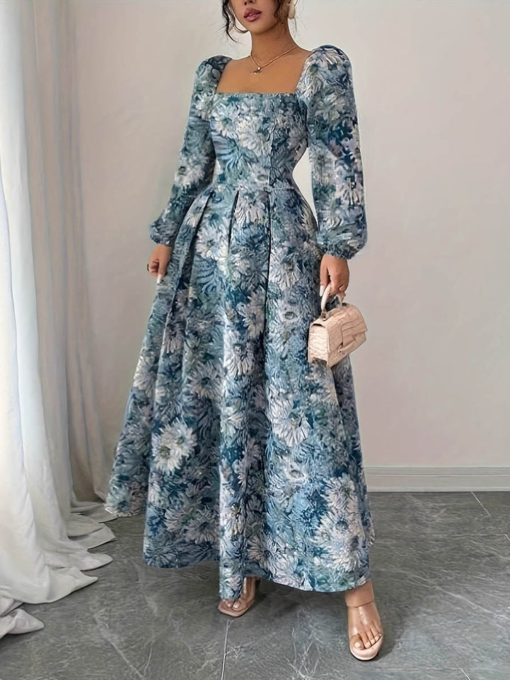 Robe longue plissée coupe trapèze, taille haute, à imprimé floral, à empiècements, à col carré, couleur contrastée