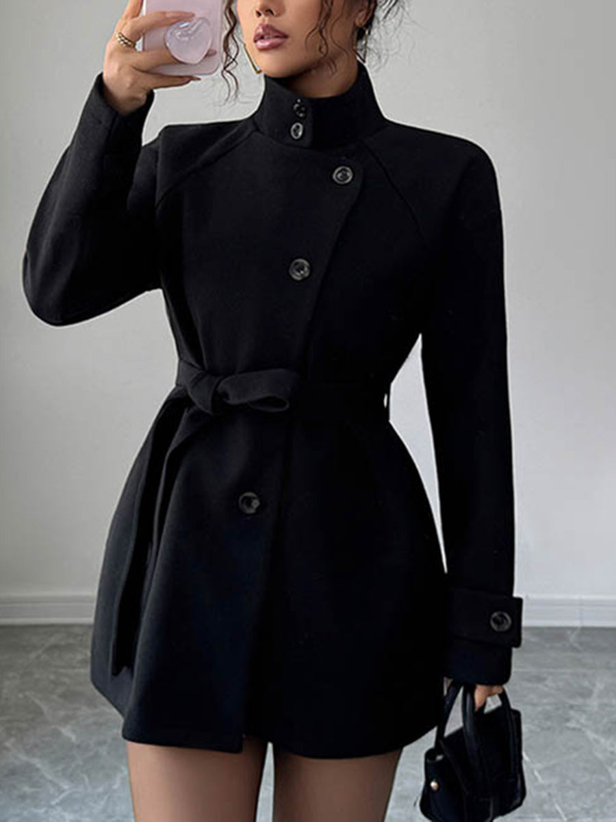 Veste asymétrique boutonnée à taille élastique, taille haute, à taille nouée, à col montant, couleur unie