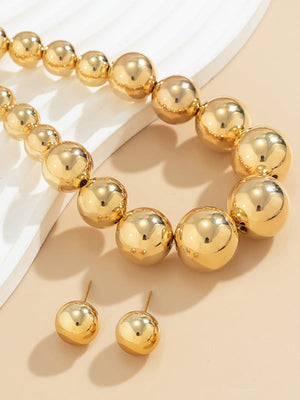 Parure collier et boucles d'oreilles perlée délicate couleur unie
