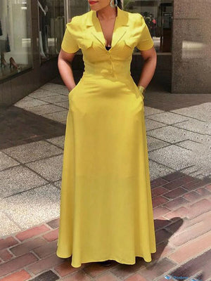 Robe longue boutonnée ample à poches, coupe trapèze, à décolleté en V profond, couleur unie