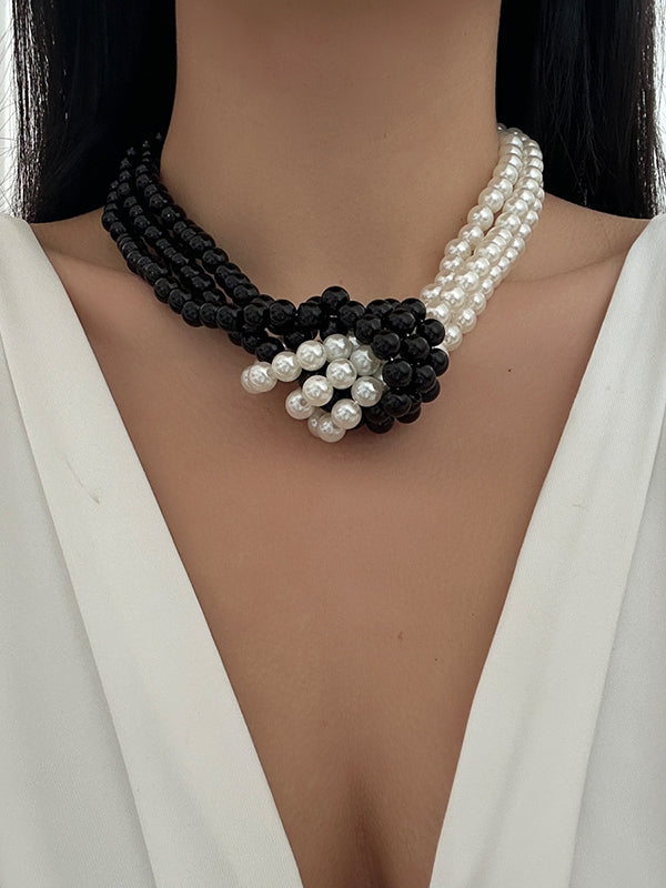 Collier perlé à empiècements