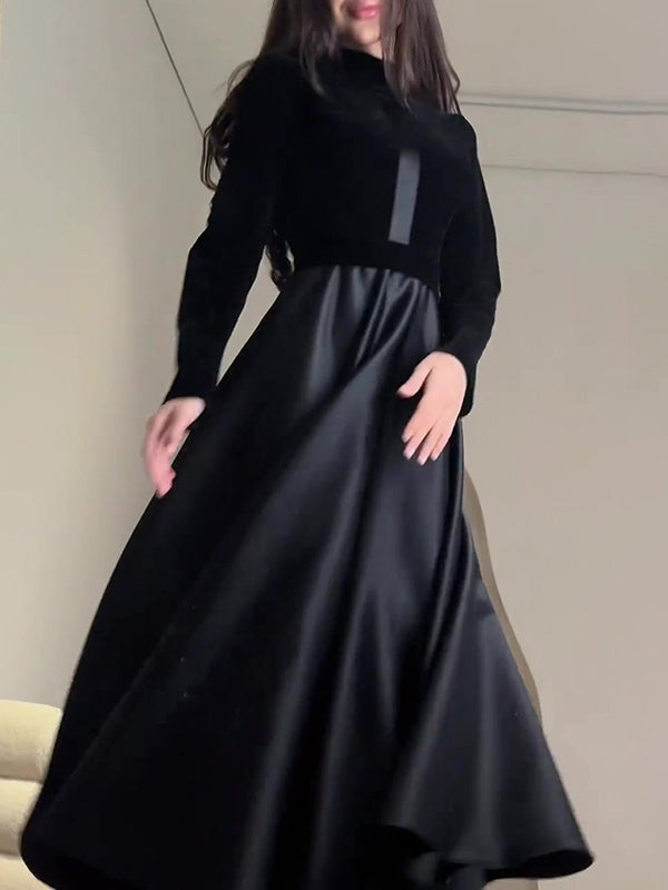 Robe longue plissée coupe trapèze, à manches longues, à empiècements, à fermeture éclair, à col cheminée