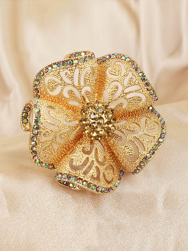 Bague réglable ajourée en forme de fleur, à strass