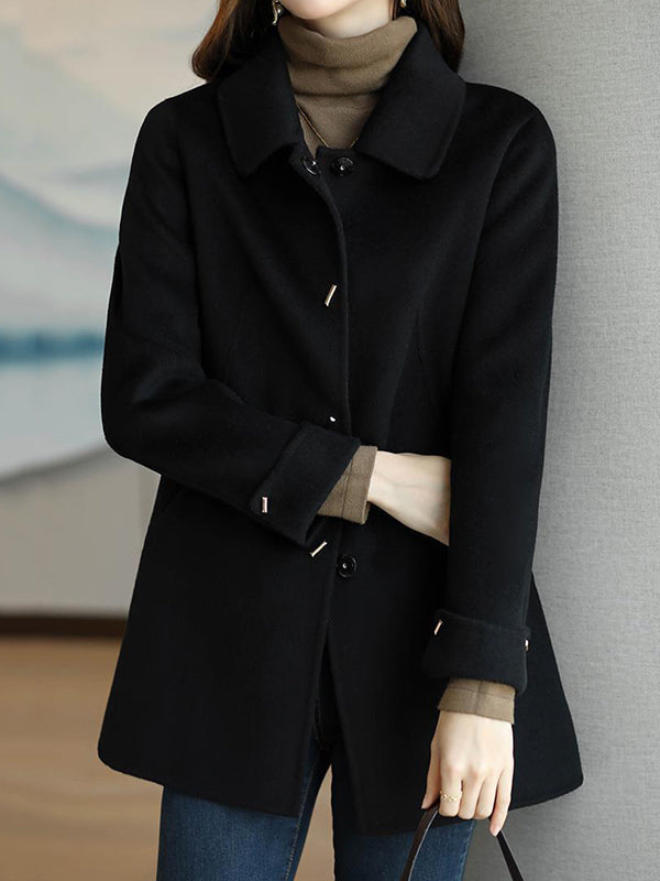 Manteau en laine ample boutonné à manches longues, à poches, à col revers, couleur unie