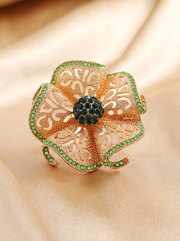 Bague réglable ajourée en forme de fleur, à strass