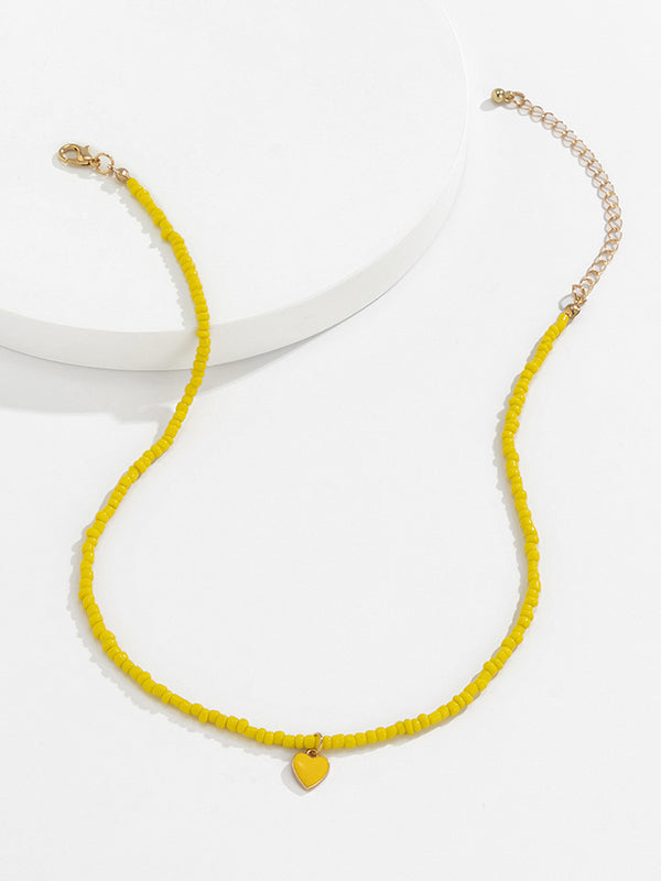 Collier à perles, couleur unie