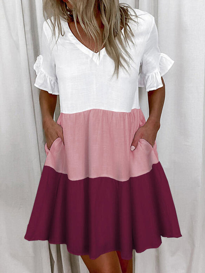 Robe mi-longue plissée imprimée coupe trapèze, taille haute, à poches, à empiècements, à col en V, couleur contrastée