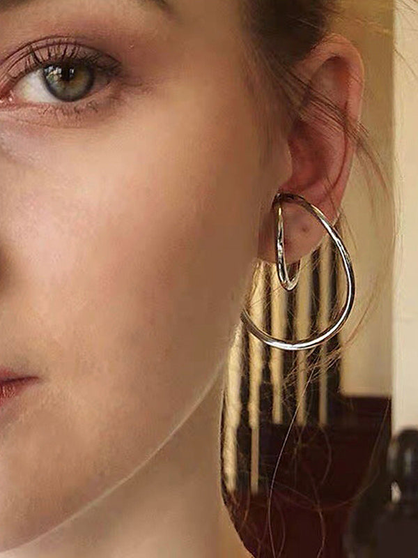Boucles d'oreilles torsadées chic et irrégulières de couleur unie