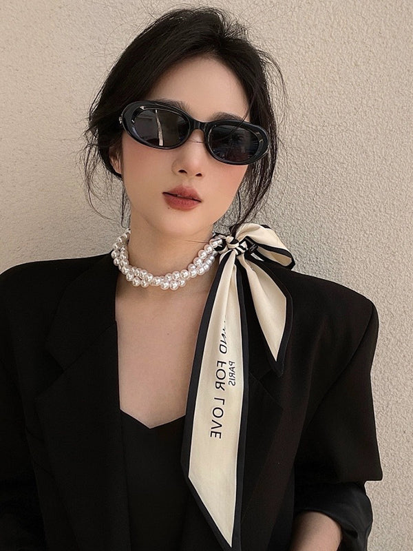Collier perlé délicat à imprimé lettres