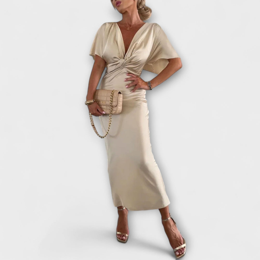 Sable - Robe maxi à décolleté en V avec nœud croisé et coupe ajustée en satin de haute qualité