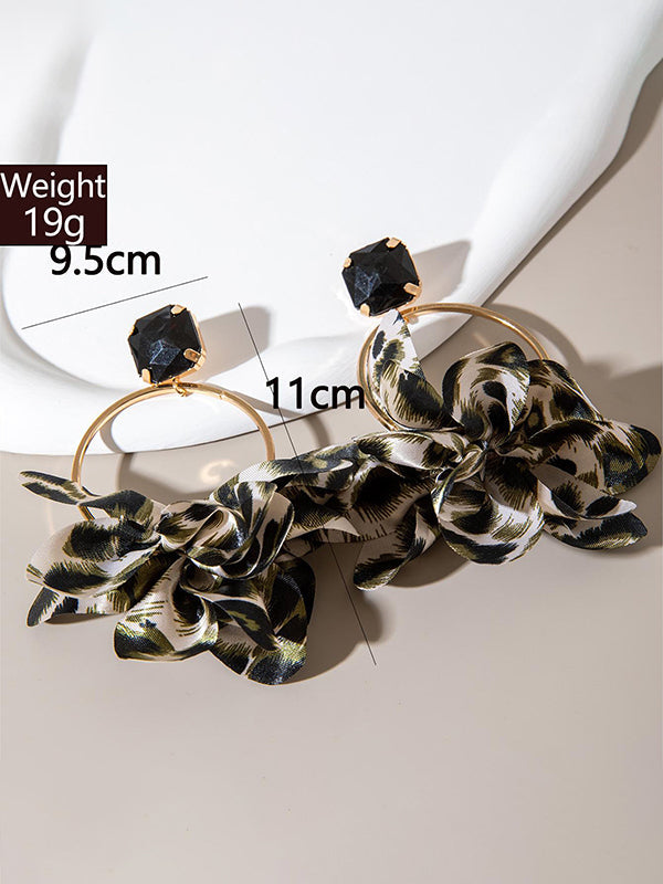 Boucles d'oreilles ajourées à imprimé léopard, à empiècements