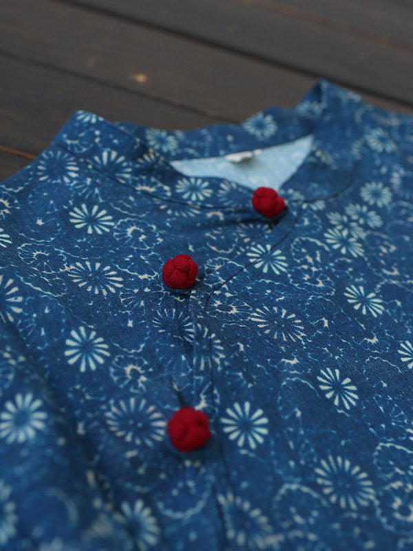 Robe mi-longue originale à col montant et motif floral uni