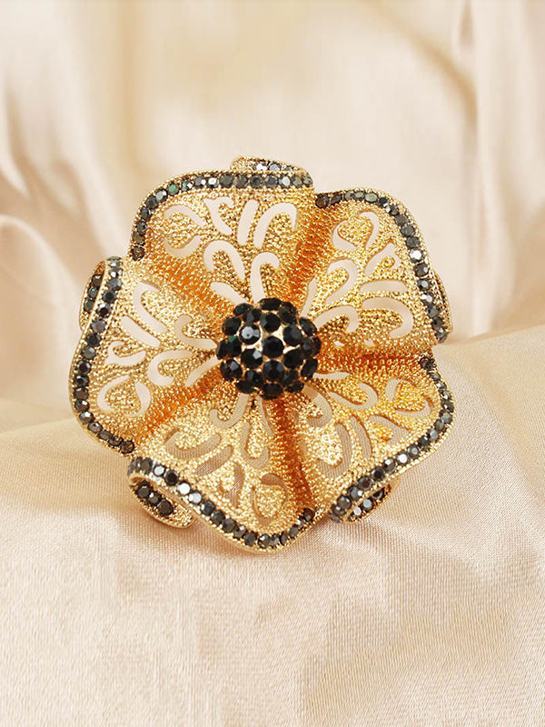 Bague réglable ajourée en forme de fleur, à strass