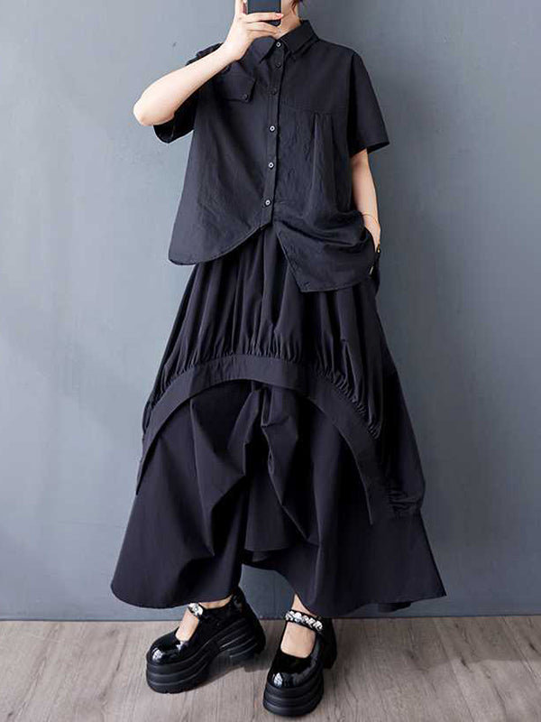 Jupe ample asymétrique plissée coupe trapèze, à taille élastique, à poches, couleur unie