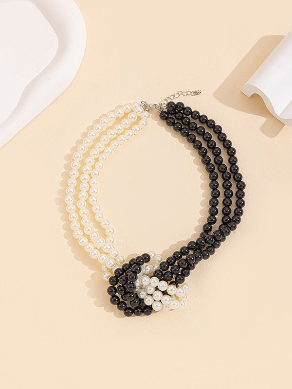 Collier perlé à empiècements